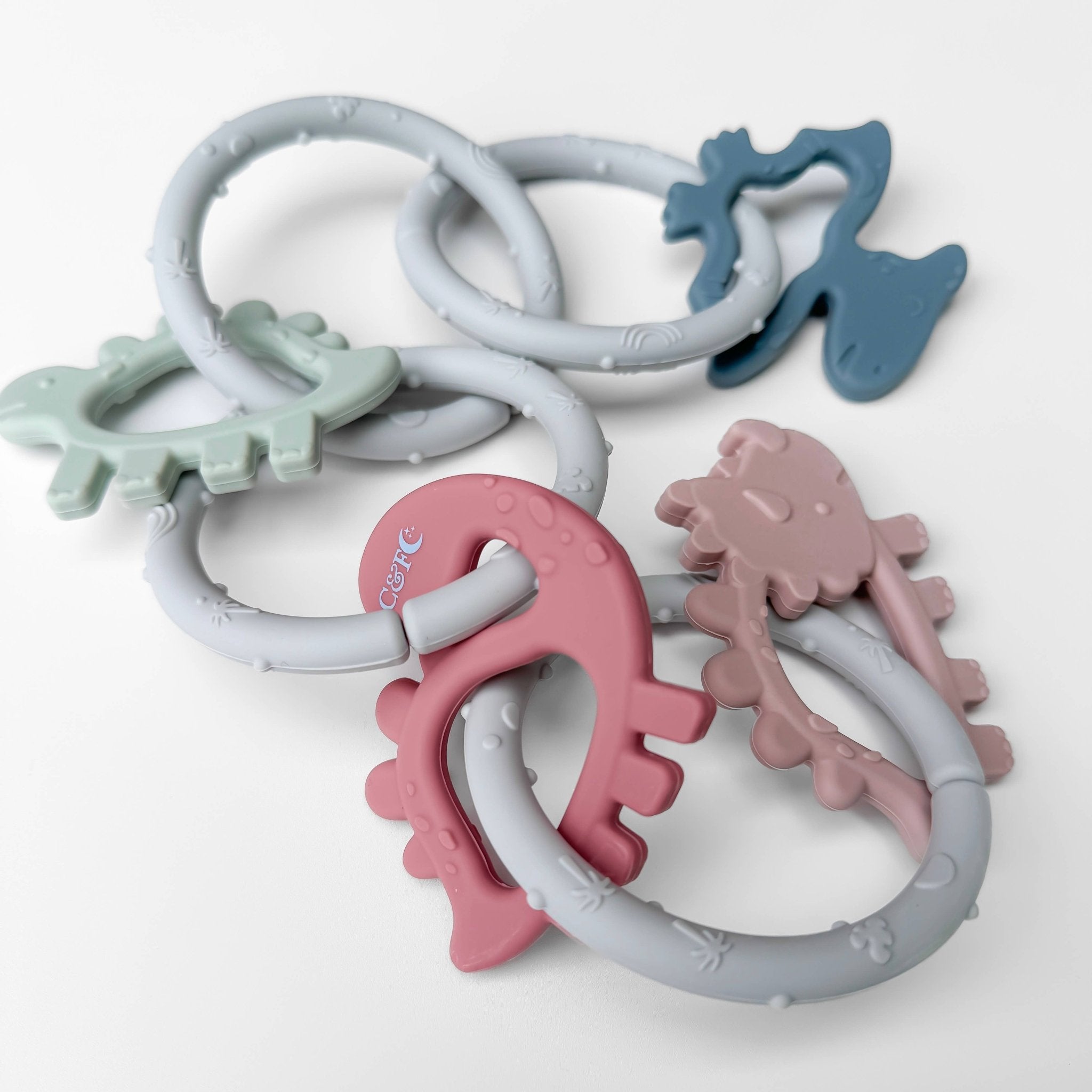 Dino Rings Silicone Teether: Pink Baby Accessories Calla & Friends