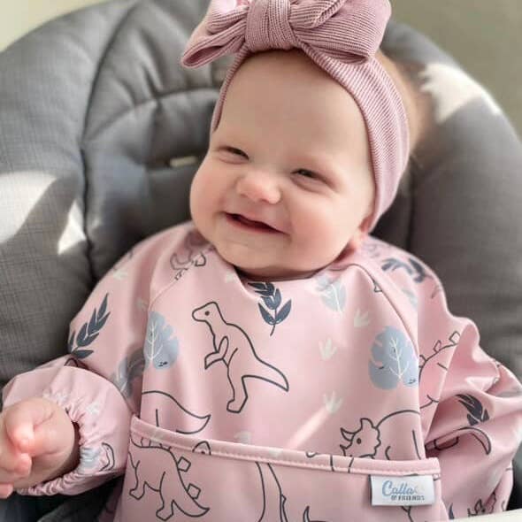 Grayson Long Sleeve Bib - Dinos - Petal Pink Baby Accessories Calla & Friends