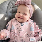 Grayson Long Sleeve Bib - Dinos - Petal Pink Baby Accessories Calla & Friends